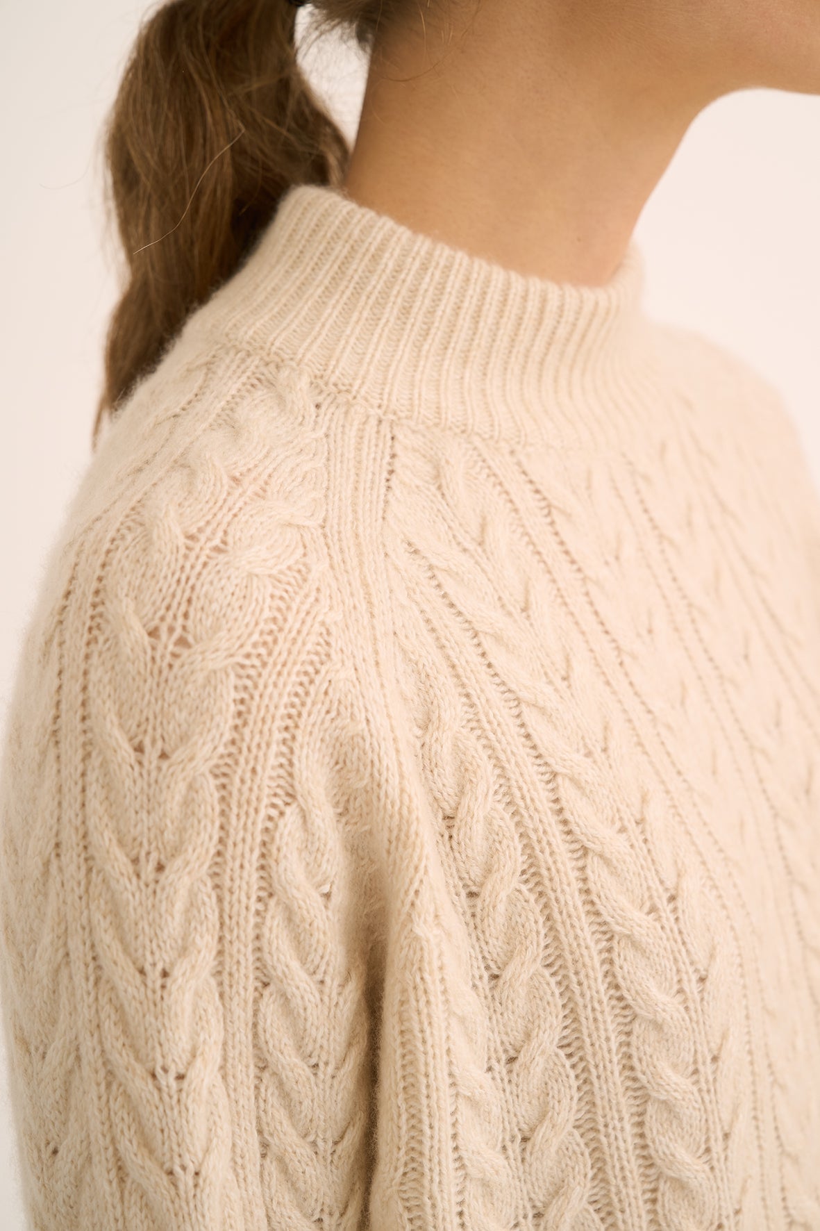 227 Asymmetric cable sweater